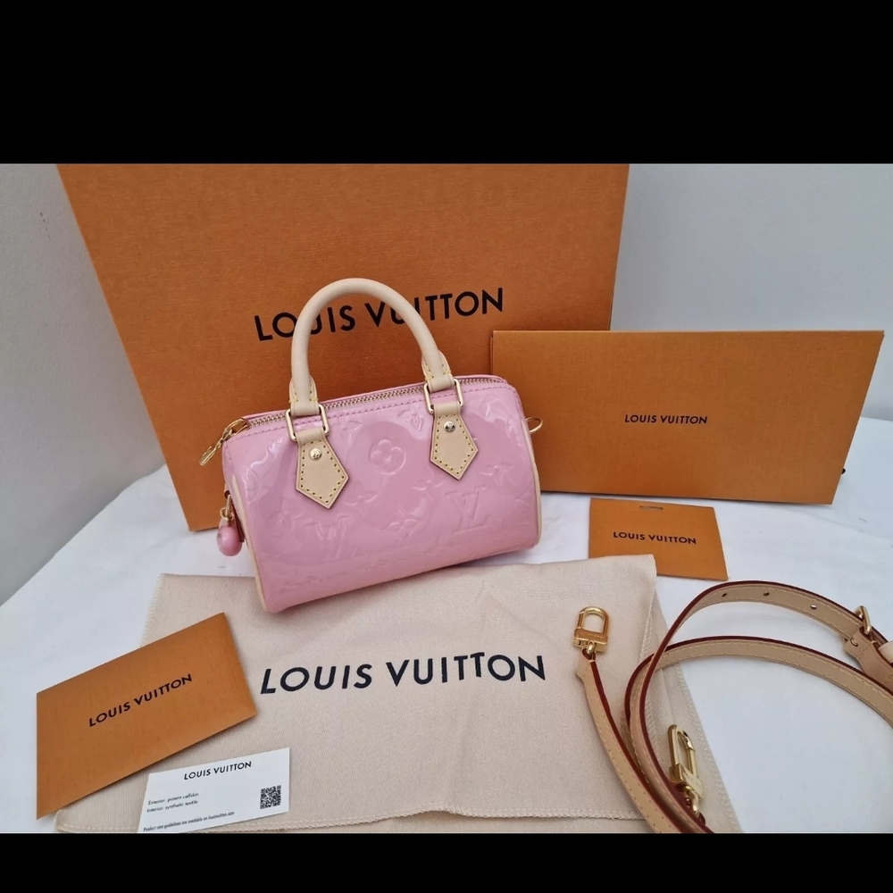 Louis Vuitton Pink Mini Bag with Gold Accents